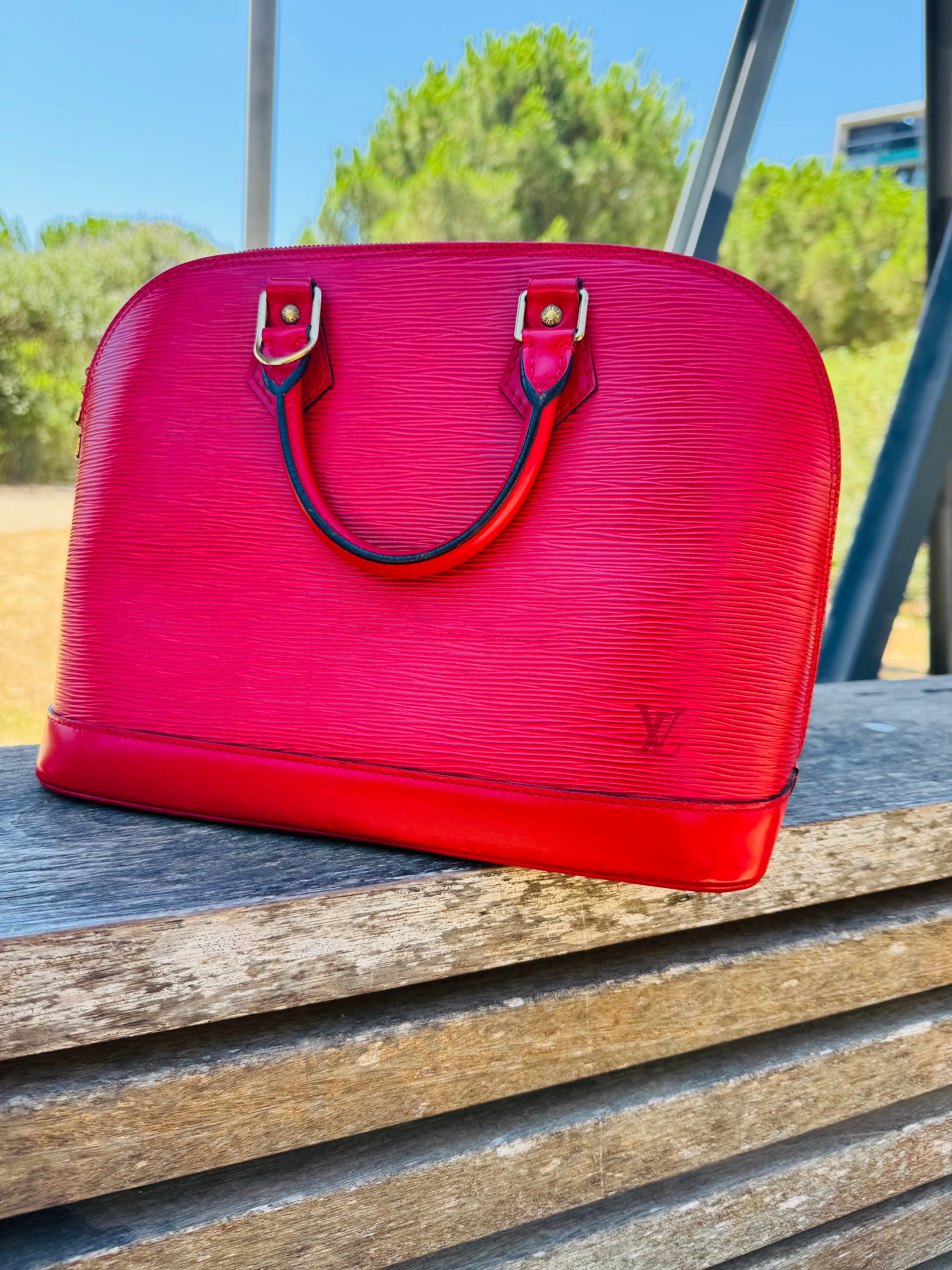 BOLSO LOUIS VUITTON ALMA PM ROJO