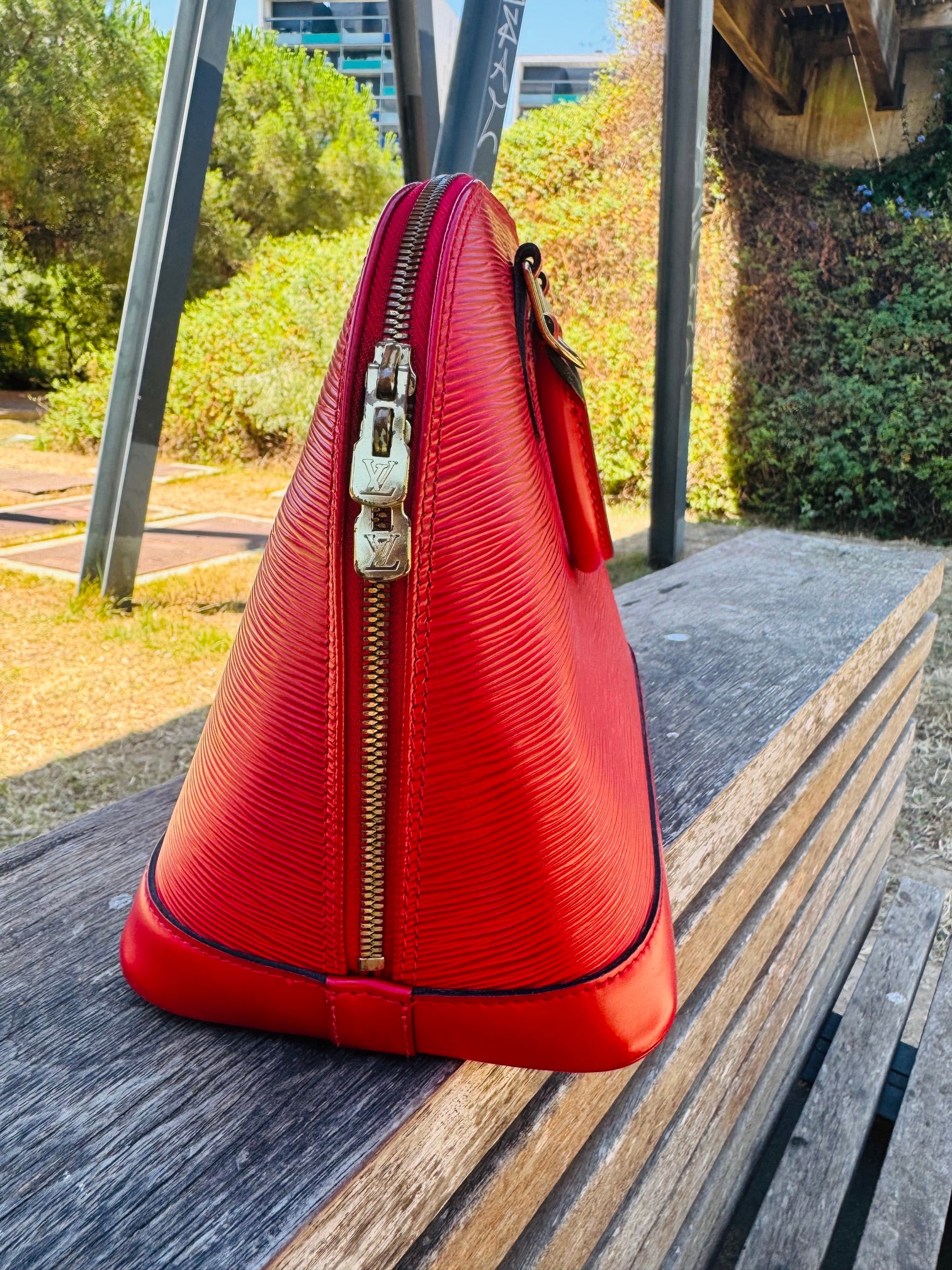 BOLSO LOUIS VUITTON ALMA PM ROJO