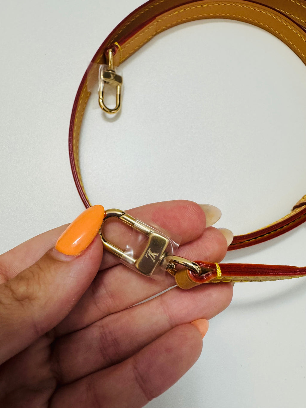 LOUIS VUITTON LOOP EN LONA MONOGRAM