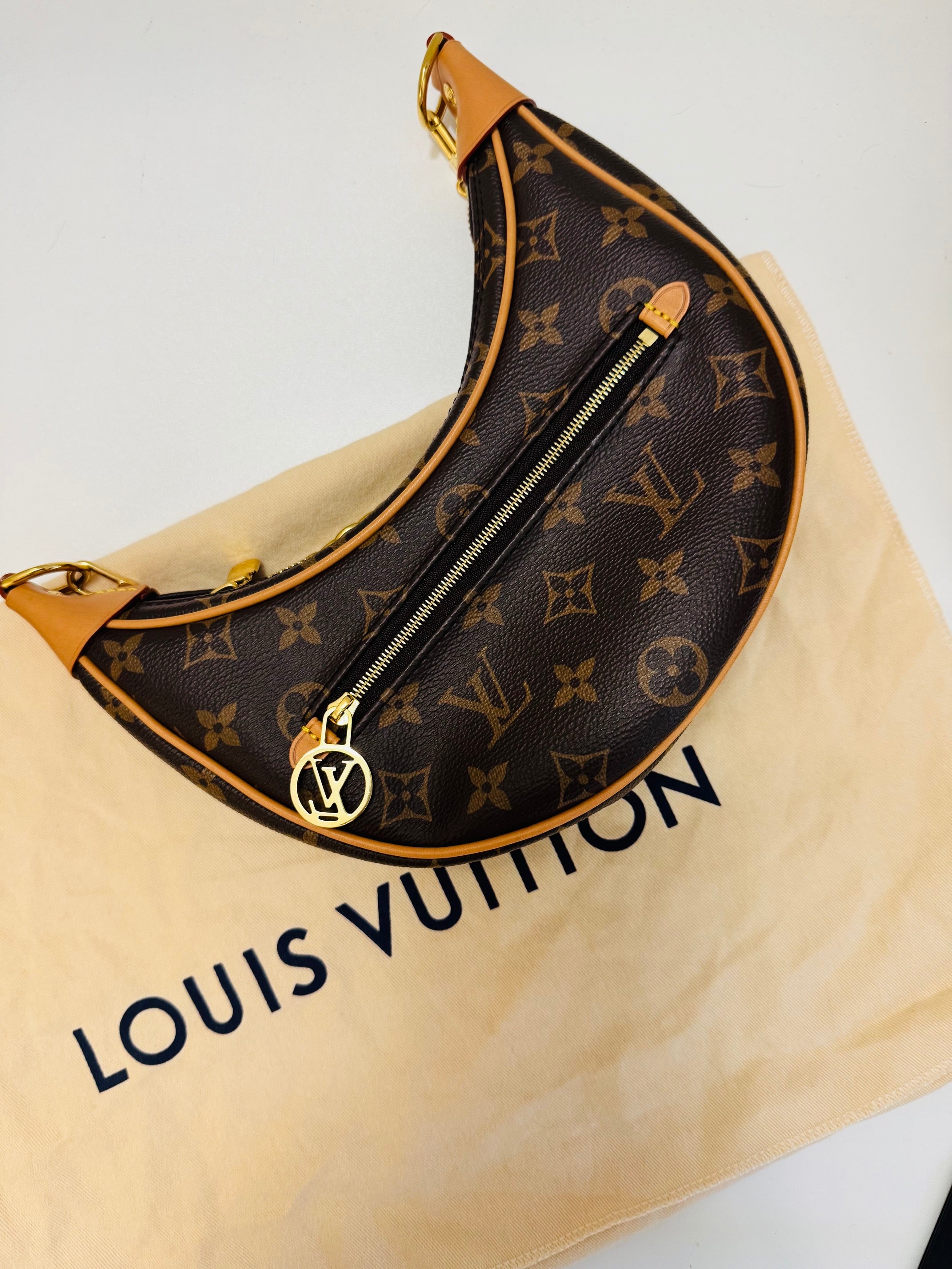 LOUIS VUITTON LOOP EN LONA MONOGRAM