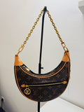 LOUIS VUITTON LOOP EN LONA MONOGRAM