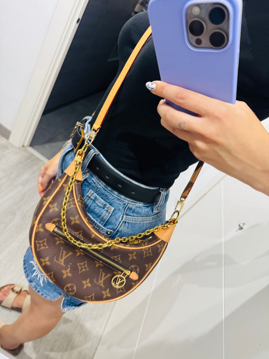 LOUIS VUITTON LOOP EN LONA MONOGRAM